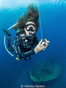 Divemaster at work by Henley Spiers 